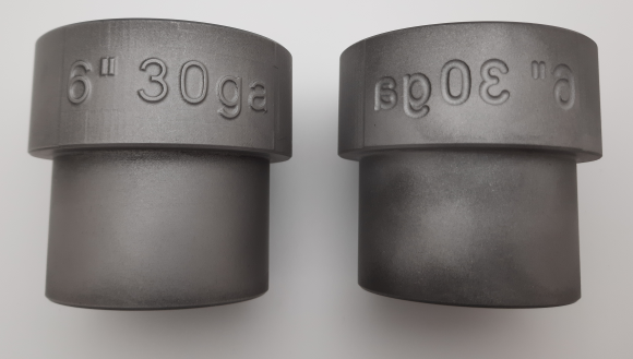 Close-up detail shot of custom embossed AC PRO lettering on industrial tooling